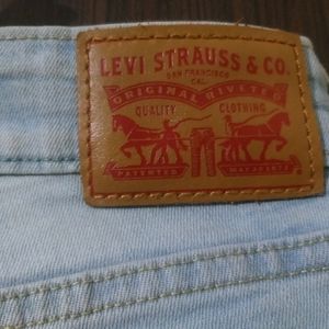 Levi's Distressed Blue Bootcut Jeans..