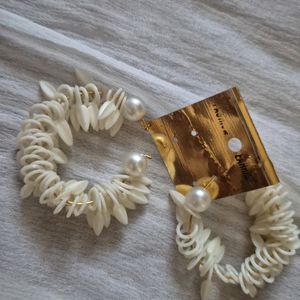 Off White Pearl Earnings