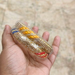 Pair Of Multicolour Bangles And Pink Earrings