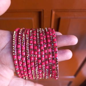 seCombo Of 12 Pink Colour Glass And 4 Kada Type Ba