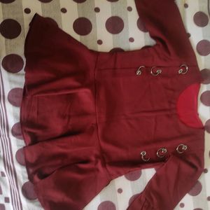 A Maroon Colored Top