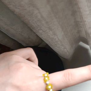 BEADED YELLOW RING FLOWER