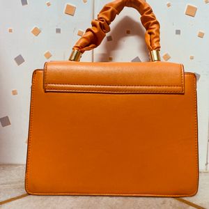 99/- Only Orange Sling Bag