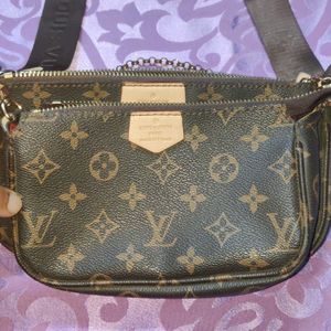 Brand New Louis Vuitton Multi Pouchtte Sling Bag..