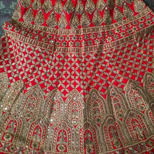 Unstiched Red And Gold Lehenga