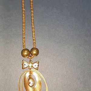 Golden Bow Necklace