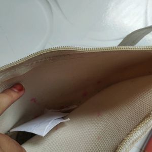 Bag With Nude Shade Lipstick