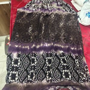 Selling A Purple & Black Dress.