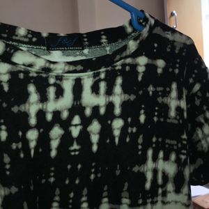 a Black charcoal tie dye type Crop Top