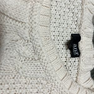 white wool sweater