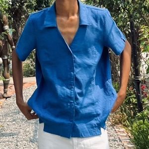 A Blue UNISEX Shirt.