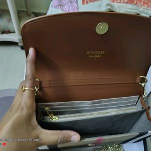 BURBERRY CLUTCH+SLING