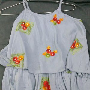 Grey Tunic Top With Floral Stitching Patterns.