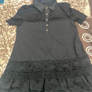 black frill top