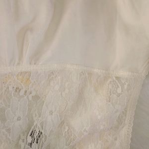 coquette off white sleeveless top