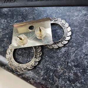 Pair Of Silver Earrings