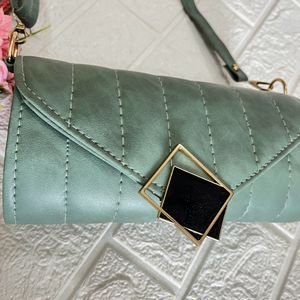 Green Roll shaped sling bag