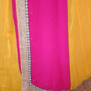 Rich Gold border Yellow lehenga with Pink dupatta