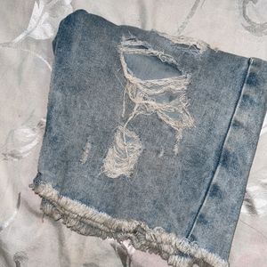 Distressed Blue Jeans