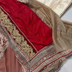 beautiful heavy saree in two colours red & cream