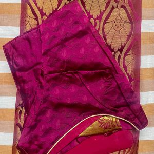 Orange kanchi Pattu Saree With Pink Pallu