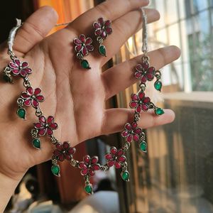 Intricate Set With Red Rubies And Emerald