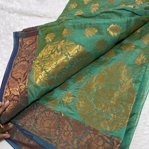 Green Saree With Brown And Blue Border