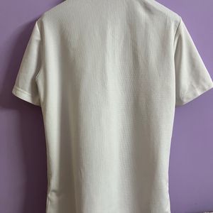 A Polo White Tshirt.