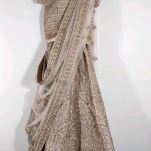 Mauve Net Embellished Bridal Lehenga (Women)