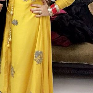 A Yellow Kurta Set With Long Trail