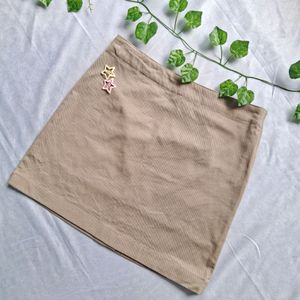 Pinterest Beige short skirt.