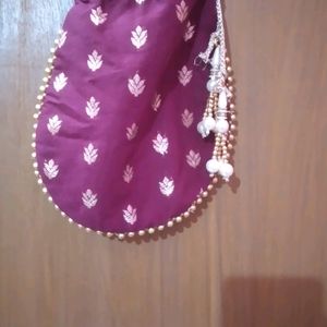 Kurta Skirt Set With Matching Potli