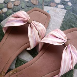 Flowered Flip flops .