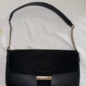 A Classic Black Shoulder Bag From Hnm