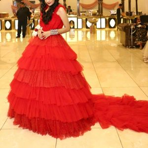 RED FLARE RUFFLE TAIL GOWN