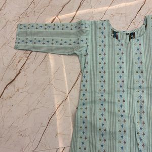 women pista green short kurta