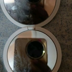 Two Mirror In One