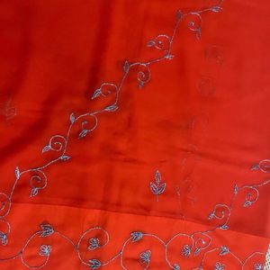 Orange Saree With Blue Shiny Embroidery