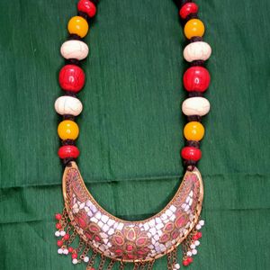 White, Yellow And Red Bohemian Necklace. 20 inches