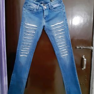 women medium washed rugged jeans