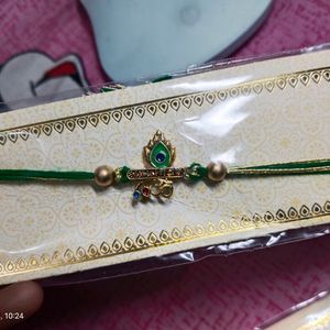 New Green Om & Peacock Feather Religious Rakhi