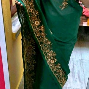 green heavy stone work saree