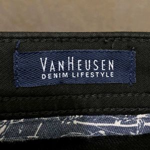 VAN HEUSEN Mid-Rise Slim Fit Jeans.