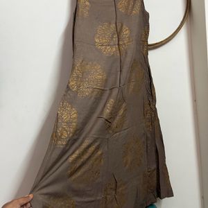 Classy Rust And Gold Colored Sleeveless Gown