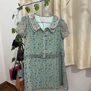 Sea Green Knee-length loose fit dress.