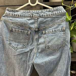 Blue Jeans With Button Detailing