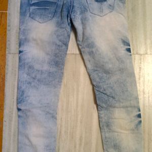 Designer jeans with multiple buttons