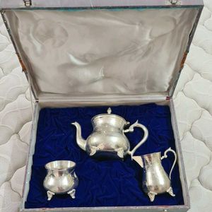 Antique Tea Set with silver polish