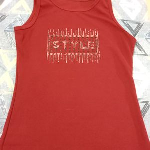 sleeveless top maroon colour with printed design