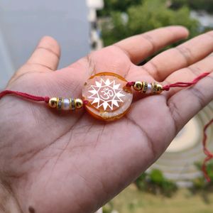 Orange Om Resin Rakhi